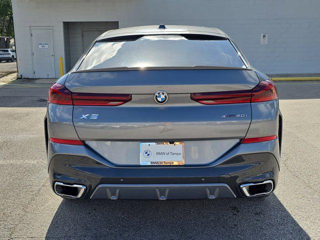 used 2025 BMW X6 car, priced at $65,776