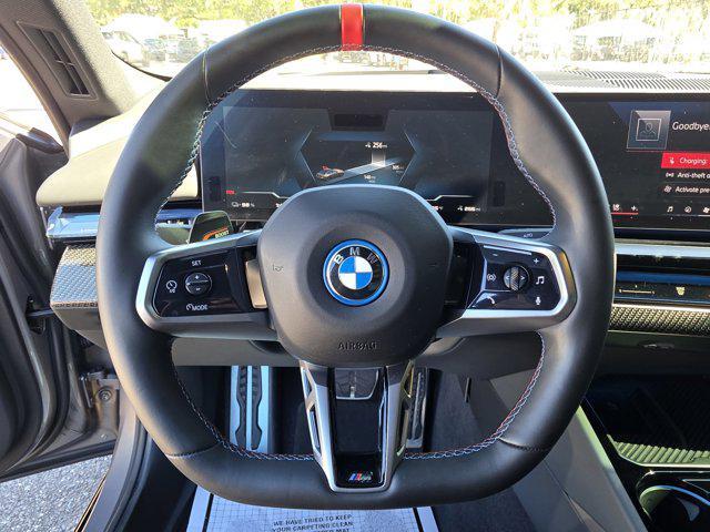used 2024 BMW i5 car, priced at $61,868
