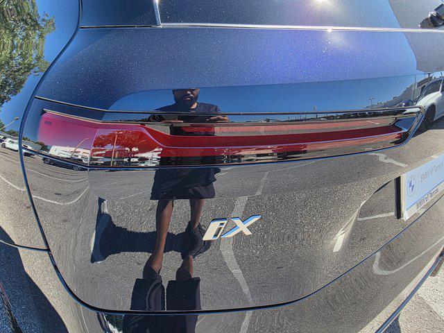 new 2026 BMW iX car, priced at $102,975