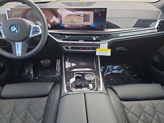 new 2026 BMW X5 PHEV car, priced at $88,975