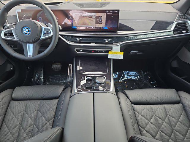 new 2026 BMW X5 PHEV car, priced at $88,975