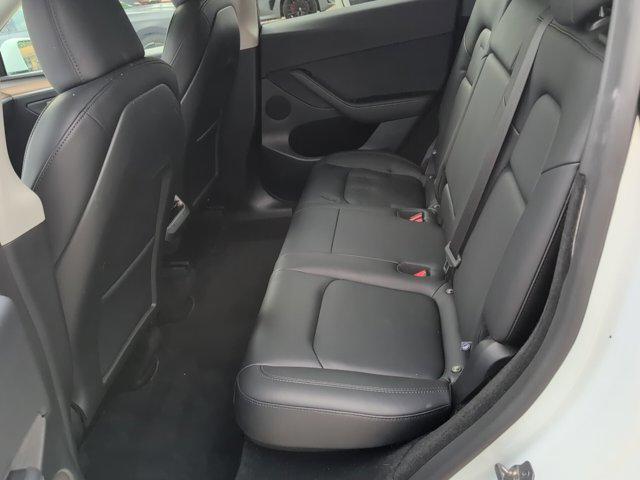 used 2025 Tesla Model Y car, priced at $37,472