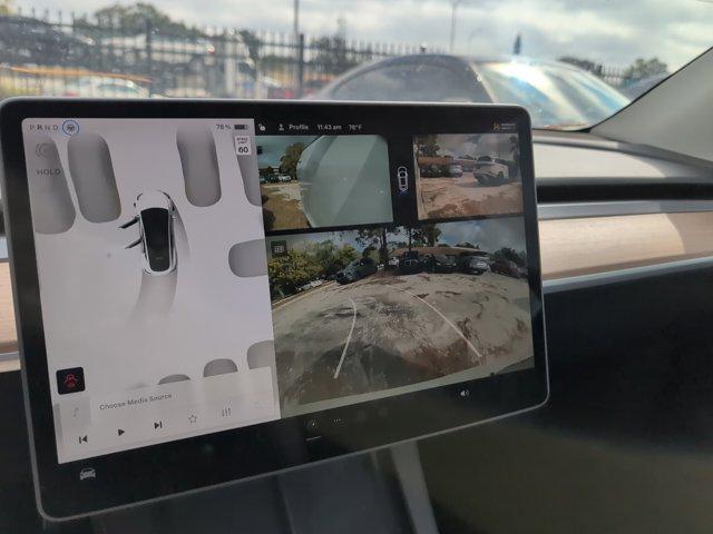 used 2025 Tesla Model Y car, priced at $37,472