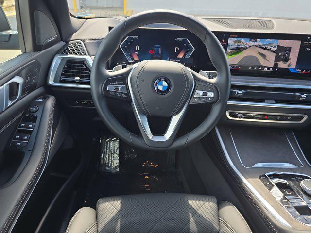 used 2025 BMW X5 car, priced at $64,797