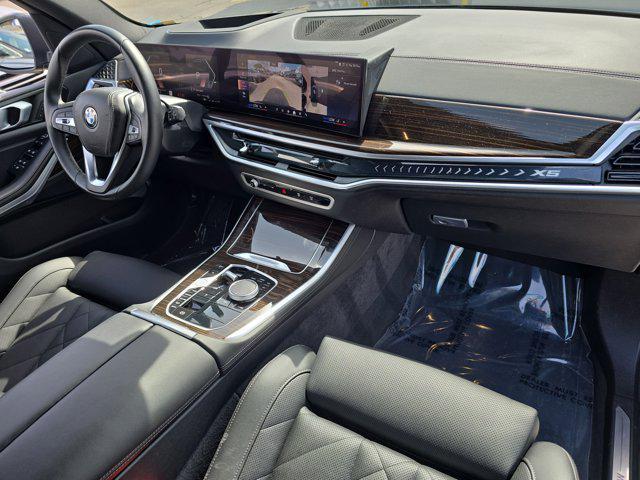used 2025 BMW X5 car, priced at $67,076