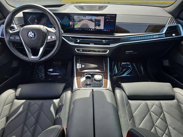 used 2025 BMW X5 car, priced at $67,076