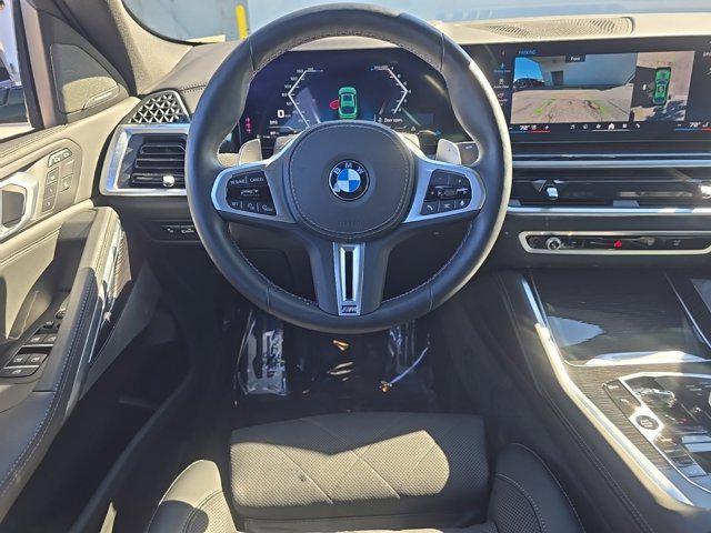 used 2025 BMW X6 car, priced at $90,000