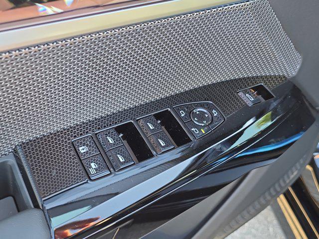 new 2025 BMW 740 car, priced at $102,125
