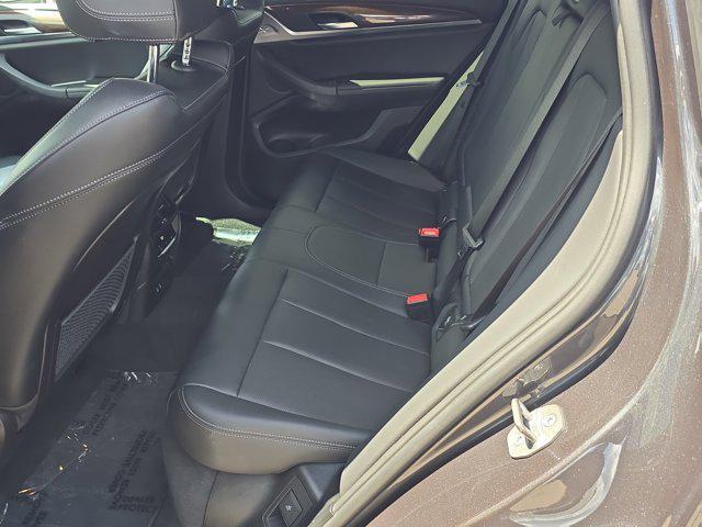 used 2023 BMW X4 car, priced at $40,538