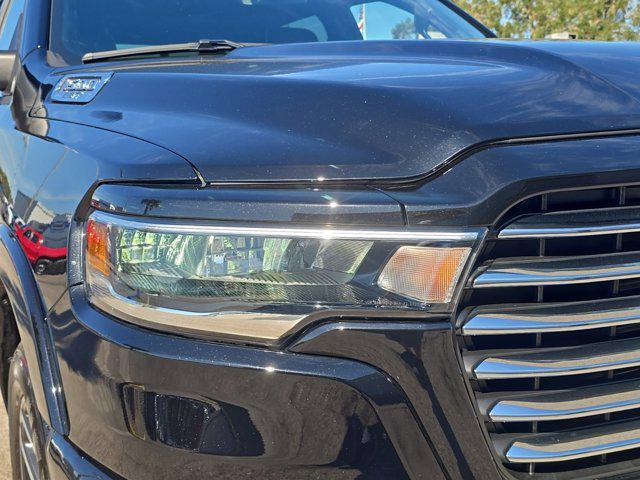 used 2025 Ram 1500 car, priced at $58,536