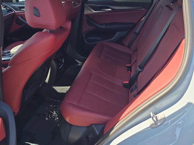 used 2025 BMW X4 car, priced at $57,999