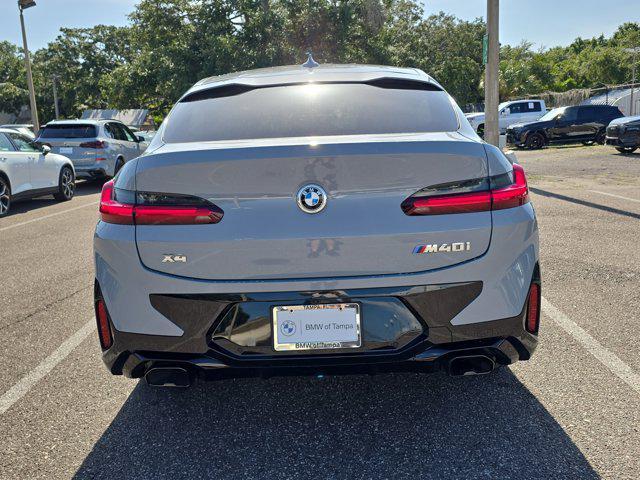 used 2025 BMW X4 car, priced at $57,999