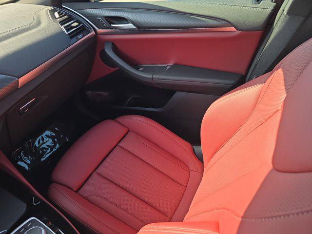 used 2025 BMW X4 car, priced at $57,999