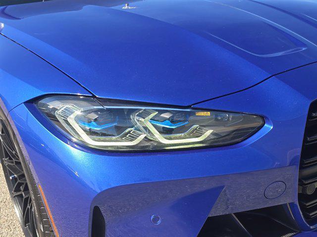 used 2022 BMW M4 car, priced at $65,000