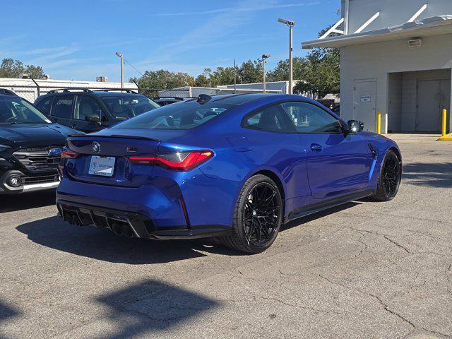 used 2022 BMW M4 car, priced at $65,000