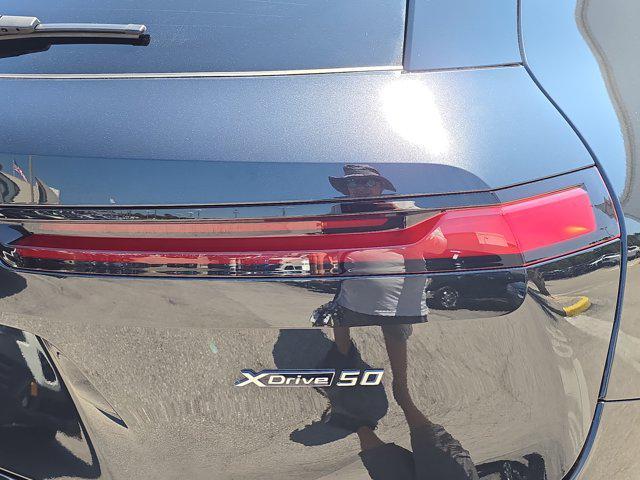 used 2024 BMW iX car, priced at $65,000