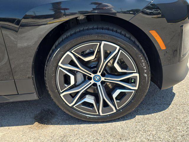 used 2024 BMW iX car, priced at $65,000