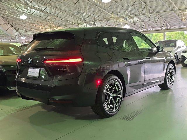 new 2024 BMW iX car, priced at $97,645
