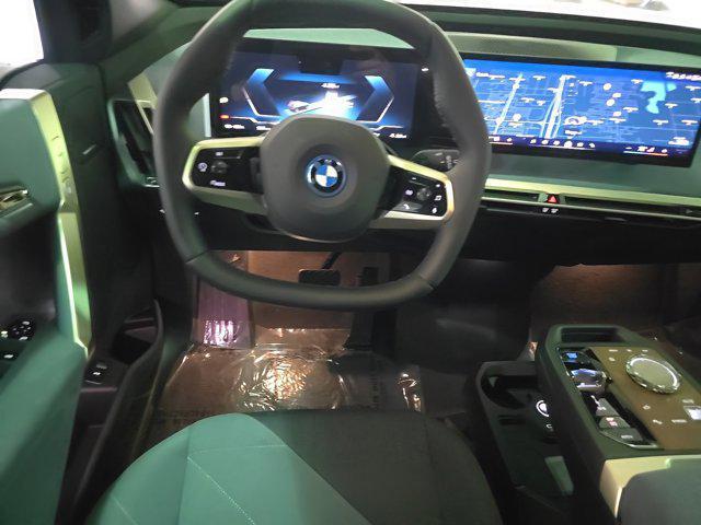 new 2024 BMW iX car, priced at $97,645