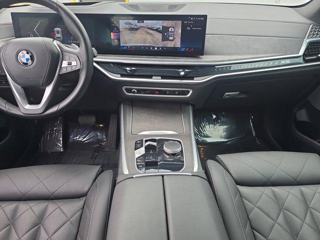 used 2025 BMW X5 car, priced at $57,048