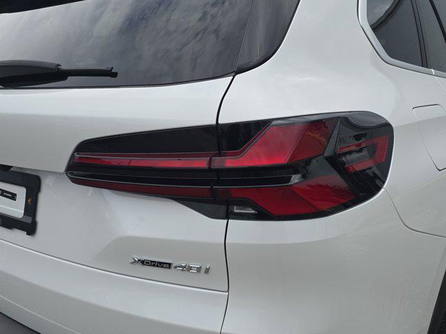 used 2025 BMW X5 car, priced at $57,048