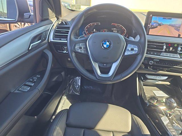 used 2024 BMW X4 car, priced at $52,636