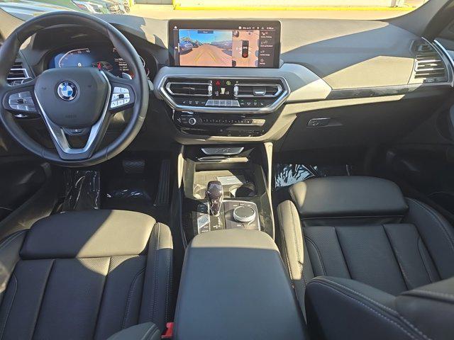 used 2024 BMW X4 car, priced at $52,636