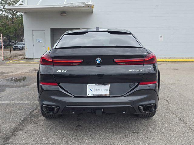 new 2025 BMW X6 car, priced at $92,375