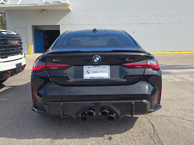 used 2024 BMW M4 car, priced at $86,377