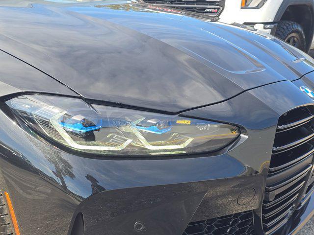 used 2024 BMW M4 car, priced at $86,377