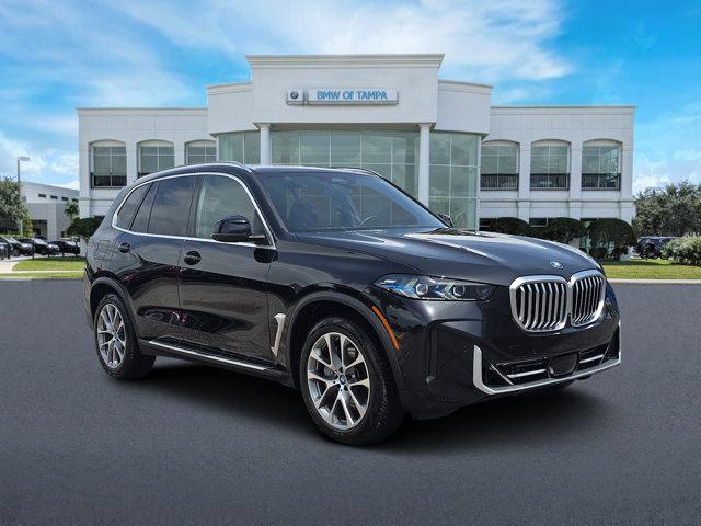 used 2025 BMW X5 PHEV car, priced at $66,392