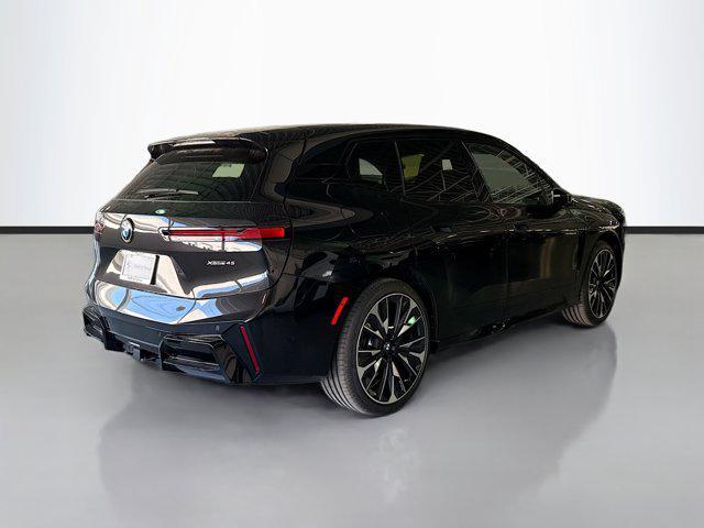 new 2026 BMW iX car, priced at $90,075