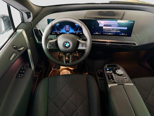 new 2026 BMW iX car, priced at $90,075