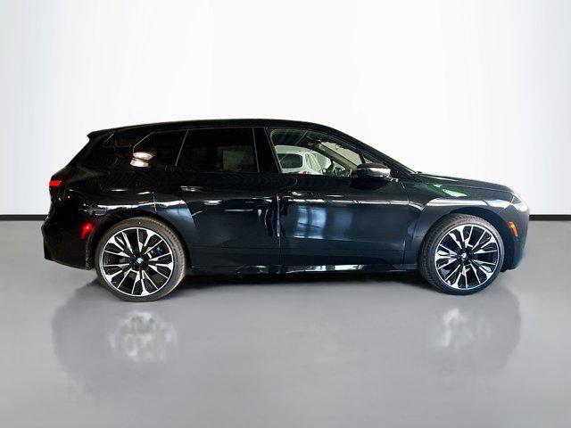 new 2026 BMW iX car, priced at $90,075
