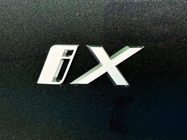 new 2026 BMW iX car, priced at $90,075