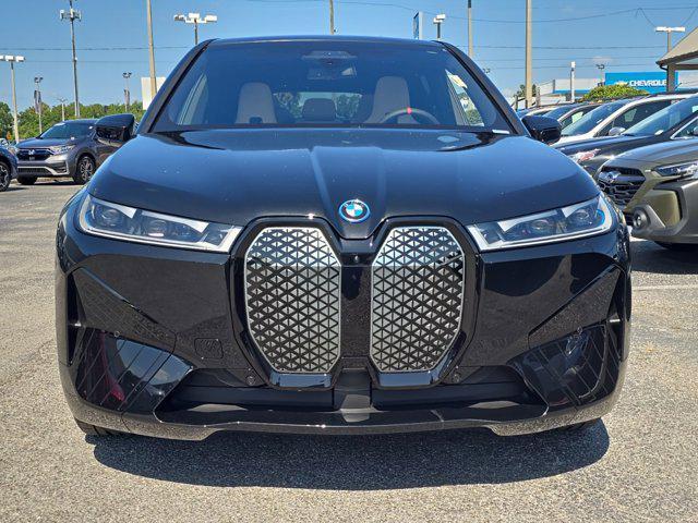 new 2025 BMW iX car, priced at $117,295