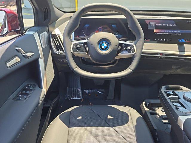 new 2025 BMW iX car, priced at $102,995