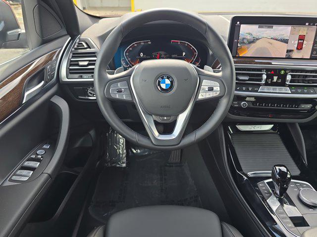 used 2025 BMW X4 car, priced at $53,448