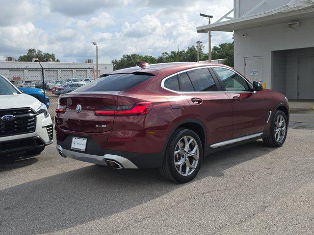 used 2025 BMW X4 car, priced at $53,448