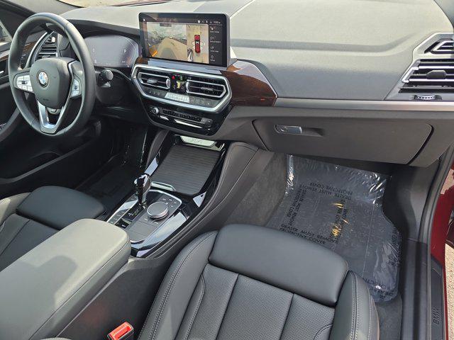 used 2025 BMW X4 car, priced at $53,448