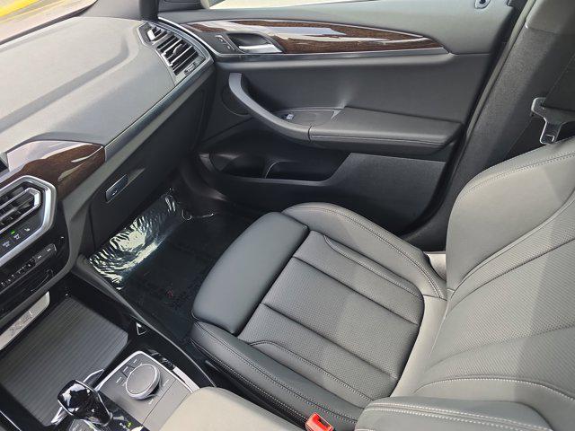 used 2025 BMW X4 car, priced at $53,448