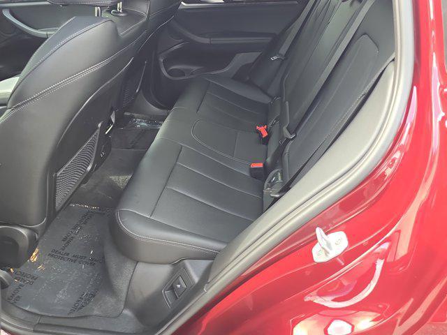 used 2025 BMW X4 car, priced at $53,448