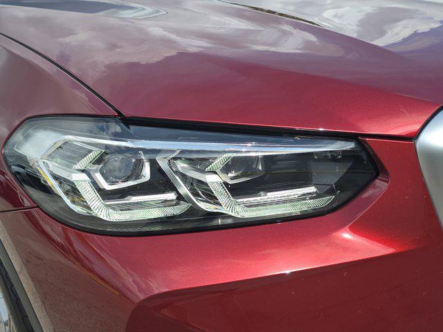 used 2025 BMW X4 car, priced at $53,448
