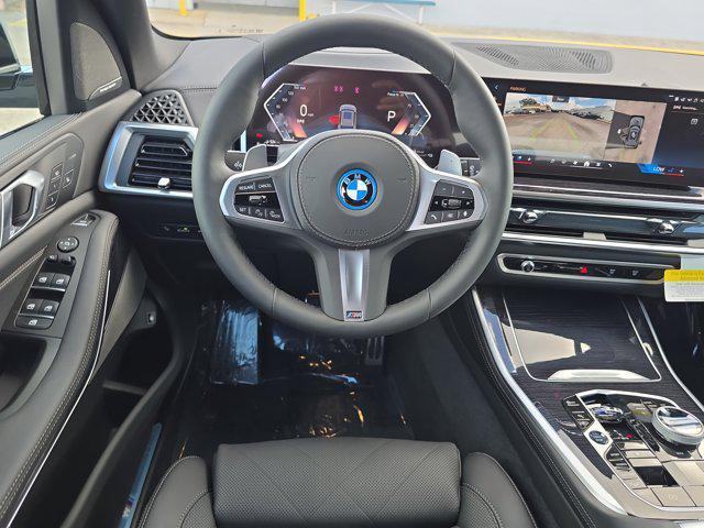 new 2026 BMW X5 PHEV car, priced at $90,625