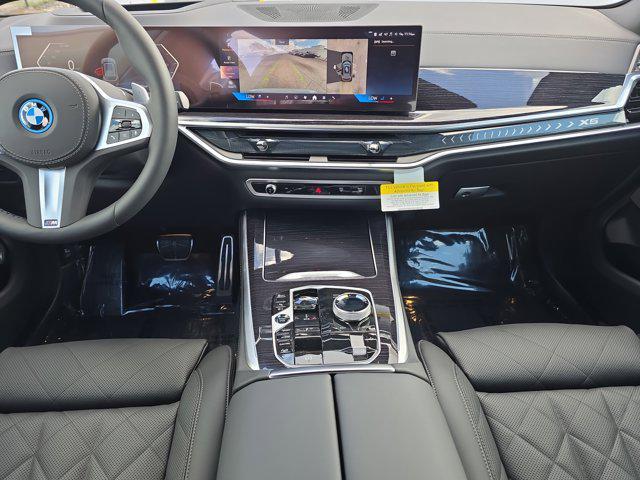 new 2026 BMW X5 PHEV car, priced at $90,625