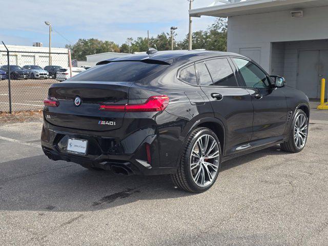 used 2023 BMW X4 car, priced at $59,105