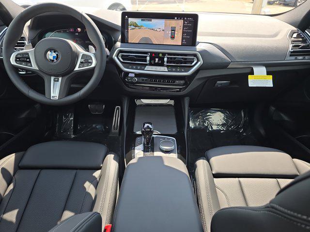 new 2025 BMW X4 car, priced at $67,075