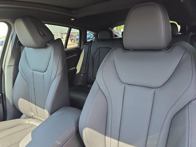 new 2025 BMW X4 car, priced at $67,075