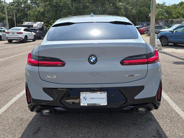 new 2025 BMW X4 car, priced at $67,075