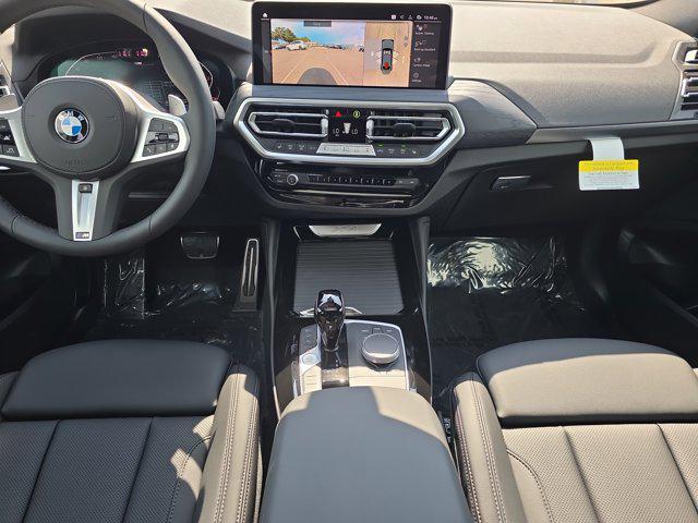new 2025 BMW X4 car, priced at $67,075
